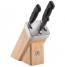 Set of 3 knives in a Zwilling Four Star self-sharpening block